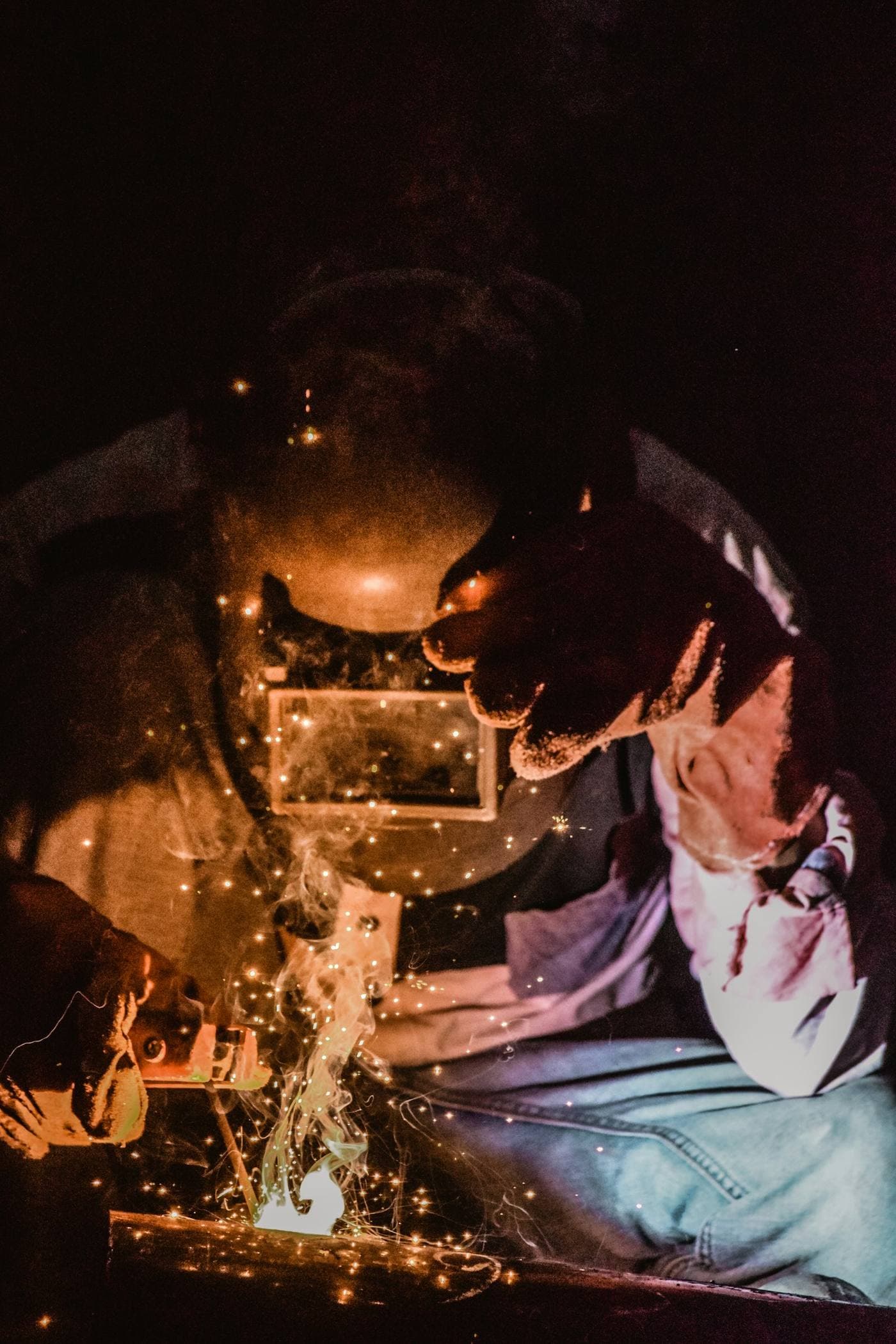Close-up of welding sparks during metal fabrication